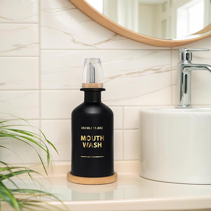 Mouthwash Dispenser for Bathroom 11.8oz – Glass Mouthwash Bottle with Cup & Bamboo Tray, Gold Hot-Stamped Lettering, Silicone Base, Modern Bathroom Accessory (Black)