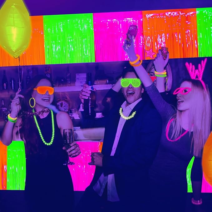 Mega-L Glow in The Dark Party Supplies, 4 Pack Foil Fringe Garland Birthday Party Decorations 9.8 ft Fluorescent Macaron Orange, Yellow and Fuchsia Metallic Tinsel Banner, Photo Booth Prop Table Skirt